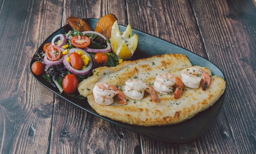 Filete Con Camarones Al Ajillo